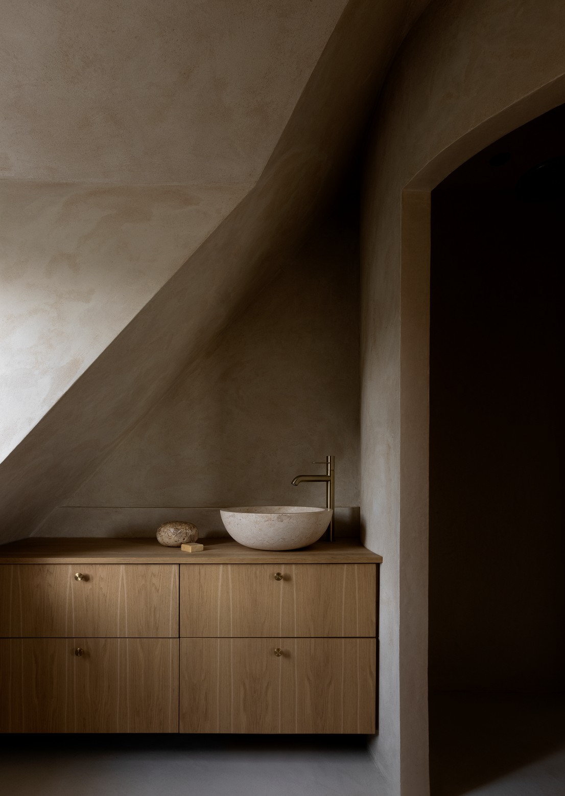 Material samples for wood, stone, tile, and warm interior finishes